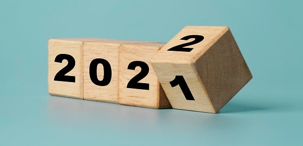 Flipping of wooden cube block for change 2021 to 2022