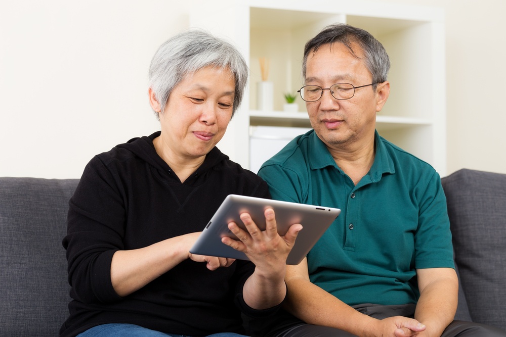 Couple using tablet