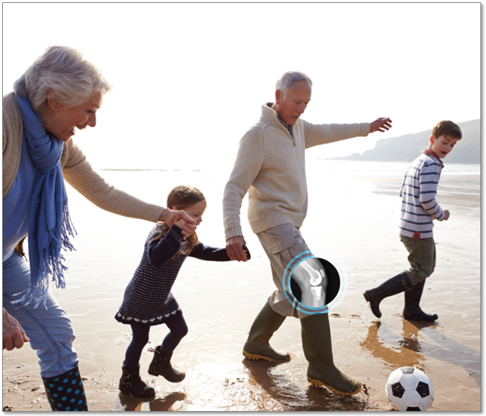 An orthopaedic patient playing soccer at the beach
